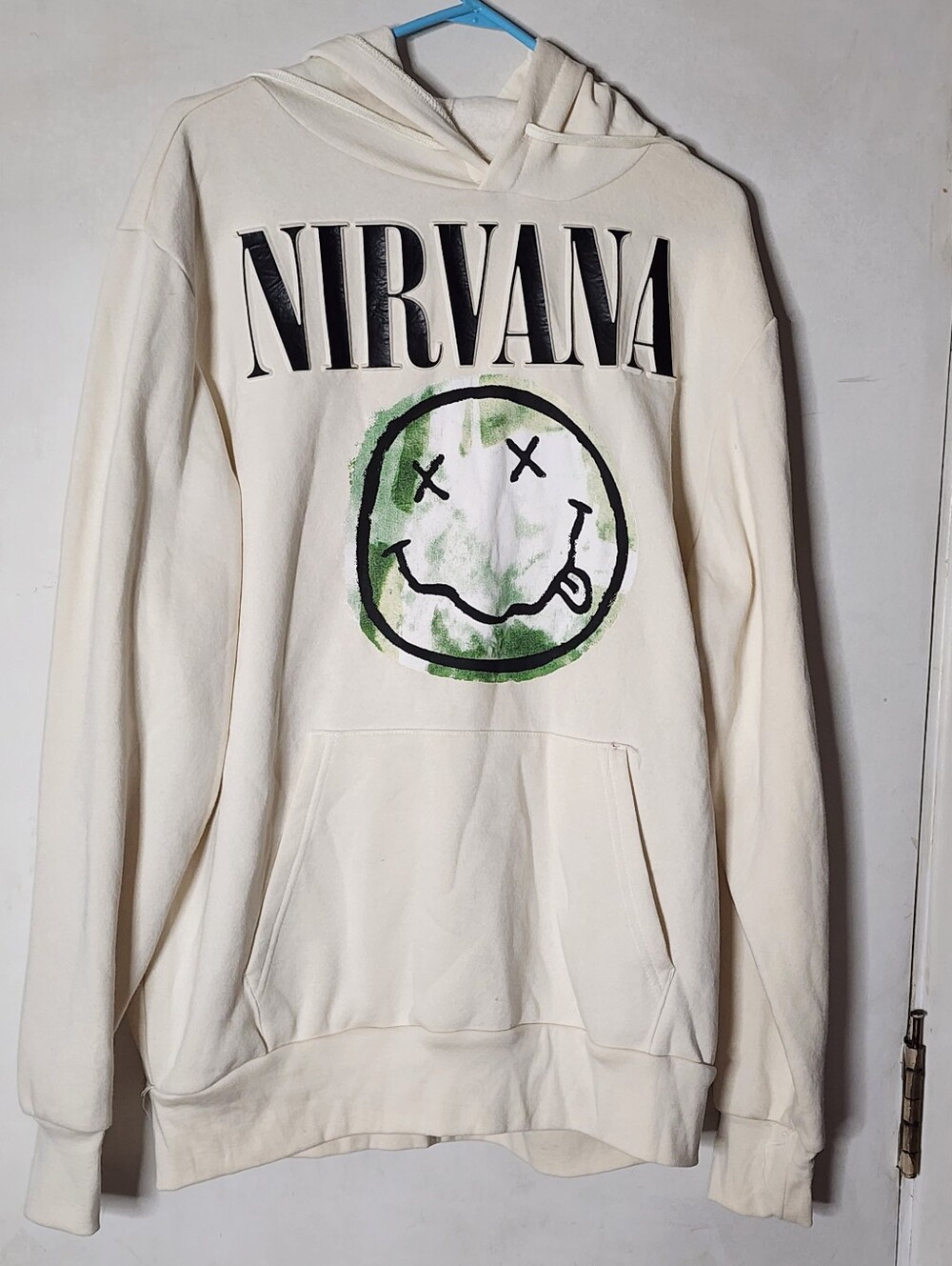 NIRVANA Cream Hoodie with Black Logo and Green Smiley